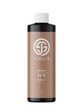 SJOLIE spray tan No.9 bottle demonstrates even mist for natural color.