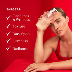 SK-II essence pressed onto face and neck to boost hydration.