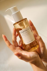 SKIN1004 Madagascar Centella Light Cleansing Oil applied to dry skin for makeup removal.