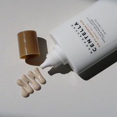 SKIN1004 Madagascar Centella Air-fit Suncream Plus application shows smooth glide and minimal white cast.