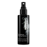 SKINDINAVIA makeup finishing spray bottle closeup for long-lasting wear.