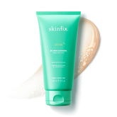 Skinfix 2% BHA Cleanser bottle pour—fragrance-free acne care for daily use.