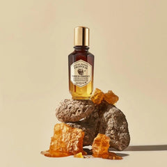 SKINFOOD 1957 Royal Honey Propolis Enrich Essence amber honey jar detail