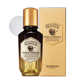 SKINFOOD 1957 Royal Honey Propolis Enrich Essence bottle close-up for radiant moisture