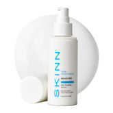 SKINN Mantle Milk Serum bottle on vanity highlighting hydration benefits