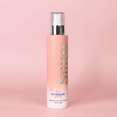 Silk'e Hair Detangler Spray bottle showing easy detangling for smoother, tangle-free hair