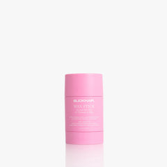 Slick Hair Co wax stick packaging closeup highlighting premium branding and compact design.
