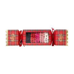 SLIP skinny scrunchies poppy in holiday cracker packaging, anti-crease styling for day-to-night looks.