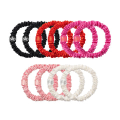 SLIP skinny scrunchies white in holiday cracker packaging, silk sheen helps prevent creasing.