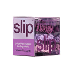SLIP skinny scrunchies lilac highlights luxurious texture and smooth hair interaction.