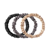 SLIP Skinny Scrunchies black close-up shows slipsilk texture and gentle crease-free hold