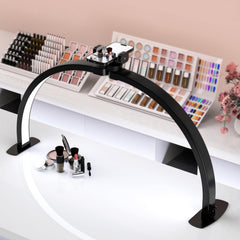 SLYFTE professional large half moon LED light illuminates nail desks with wide coverage for detail work.
