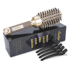 Sndyi round brush with ceramic barrel for smooth, even heat during blowouts.