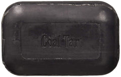 The Soap Works coal tar bar soap lathering into rich foam for gentle cleansing.
