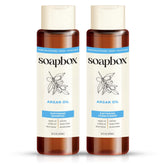 Soapbox Argan shampoo bottle highlights volumizing formula for smooth, frizz-controlled hair.