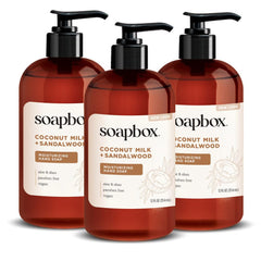 Soapbox liquid hand soap bottle with coconut milk sandalwood scent for daily cleansing.