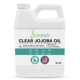 Soapeauty Clear Jojoba Oil bottle with label, 32oz, a versatile skin, hair, and nails hydrator.