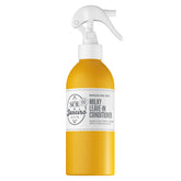 Sol de Janeiro Milky Leave-In Conditioner bottle close-up showing lightweight hydration for hair.
