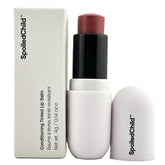 SpoiledChild conditioning tinted lip balm plum tube closeup shows smoothing, hydrating lip care.