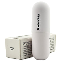 SpoiledChild lip balm plum packaging closeup emphasizes premium design and portable prep.