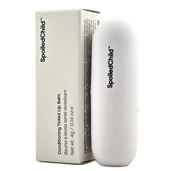 SpoiledChild lip balm plum arm swatch reveals sheer berry tint for everyday color.