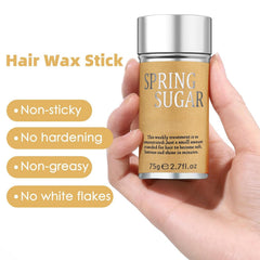 SPRINGSUGAR retractable hair wax stick in hand for mess-free travel touch-ups