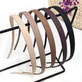Springtime square headband black close-up with teeth for secure grip.
