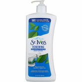 St. Ives Renewing Lotion bottle closeup showing quick-absorbing formula.