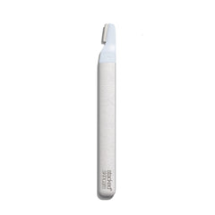 StackedSkincare dermaplaning tool refill in hand for quick, hygienic blade replacement.