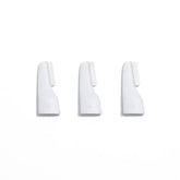 StackedSkincare replacement blades 3-pack closeup for at-home peach fuzz removal and exfoliation.