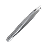 Staleks Pro Expert 10 eyebrow tweezers closeup shows precise pointed tips for ingrown hairs.