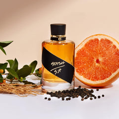 Stash by Sarah Jessica Parker woman applying fragrance suggests easy daily routine.