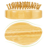 Stylemate Bamboo Hair Brush palm-grip shows ergonomic design for gentle detangling across hair types