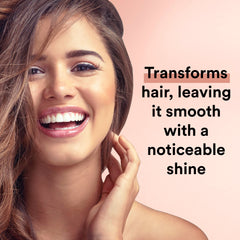 Suave Moroccan Oil Infusion Conditioner hair strand closeup shows frizz control and smoothness.