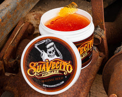 Suavecito Original Hold Pomade 32oz tub label closeup highlights scent and water-based formula