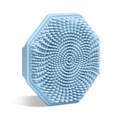 Sud Scrub antimicrobial face scrubber blue demonstrates gentle cleansing for clearer pores.