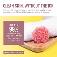Sud Scrub soft-bristles closeup in pink highlighting pore-clearing action.