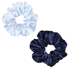 Assorted blue Sufermoe scrunchies shown on model coordinated with outfit.