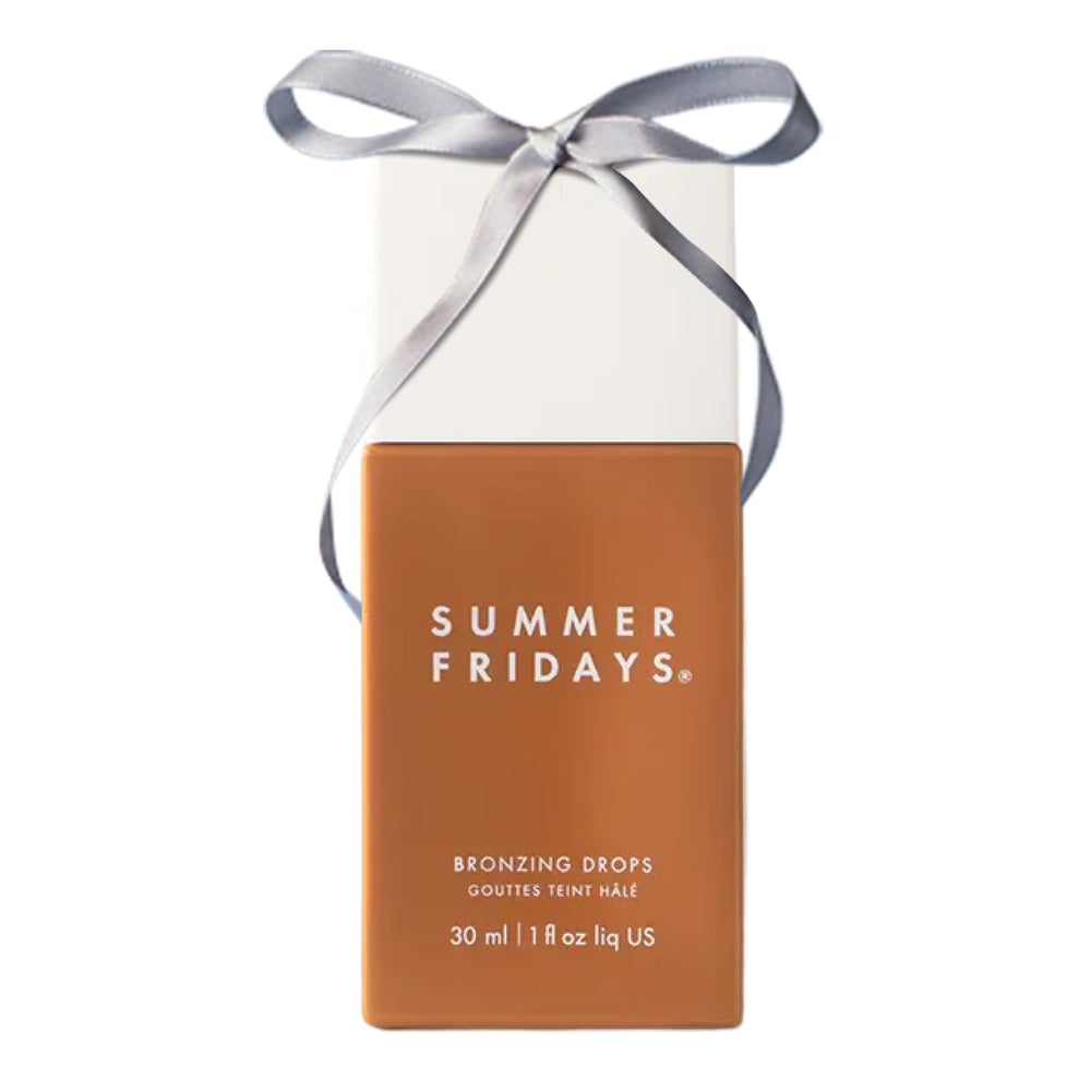Summer Fridays Bronzing Drops bottle close-up highlighting hydrating serum-like formula for a healthy glow.