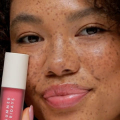 Summer Fridays Dream Lip Oil on lips demonstrates high shine and smooth feel