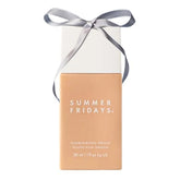 Summer Fridays Illuminating Drops bottle close-up showing dewy hydration