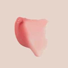 Summer Fridays Pink Sugar tinted balm being applied to lips for subtle shine