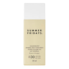 Summer Fridays ShadeDrops SPF 30 mineral milk bottle pour demonstrates easy, lightweight sun protection.