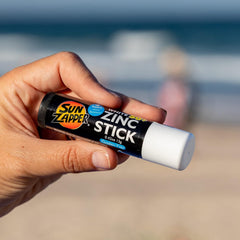 Close-up of white zinc stick highlighting natural-looking, skin-friendly finish.