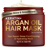 SUNATORIA hair mask jar with keratin and argan oil delivers deep hydration for dry, frizzy hair.