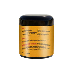 Sunny Isle Pure Butter applying to hair for smoother strands and scalp comfort.