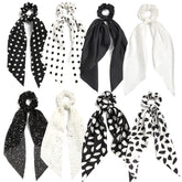 SUSULU hair scarf scrunchie in black provides secure hold for busy mornings.