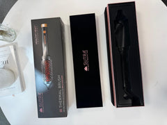 SUTRA Thermal Brush tourmaline-infused bristles deliver glossy, frizz-free shine.