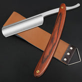 SXDGS Straight Razor No.147 with strop close-up for precise shaving and edge care.
