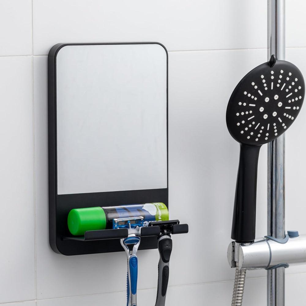 TAILI fogless shower mirror suction mount provides fog-free shaving visibility.